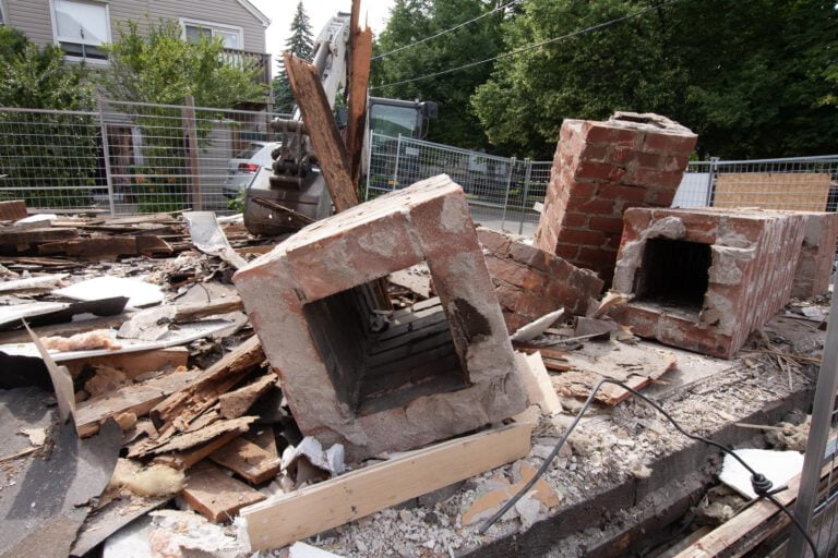 old brick chimney ready to be moved off-site