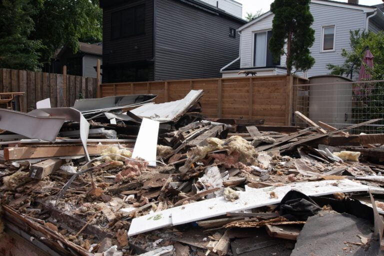 pile of demolition debris on a residential property, ready to be transported off-site