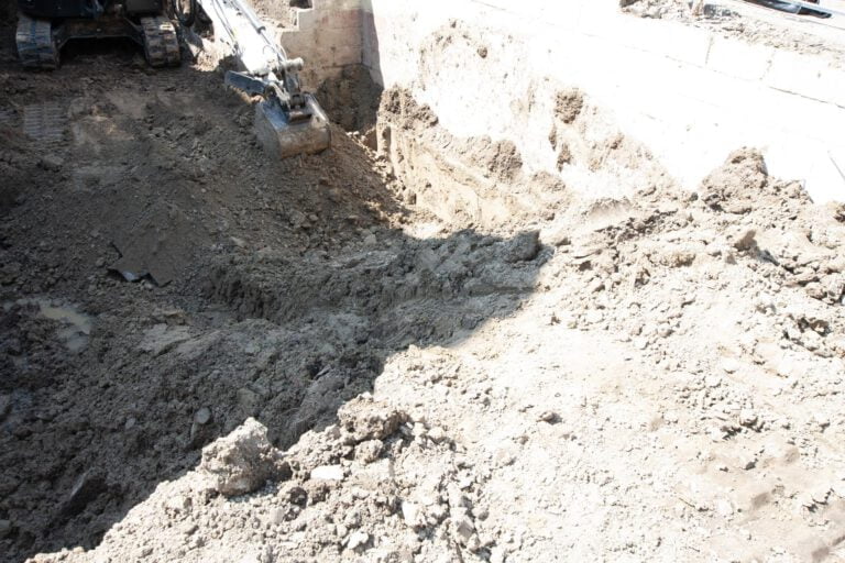 levelling the ground with an excavator