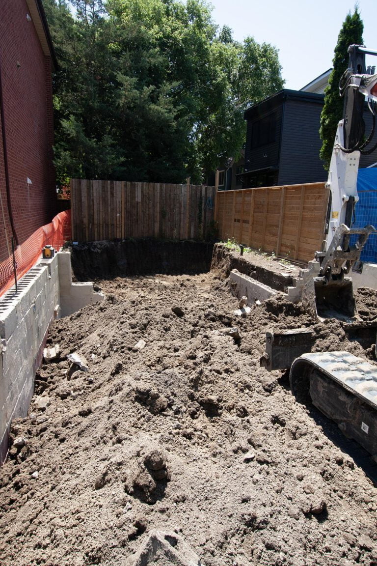 excavator used to remove soil during a residential excavation project