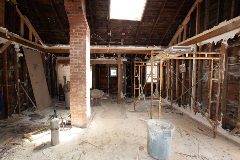 Fully stripped interior walls and ceiling in preparation for full exterior demolition