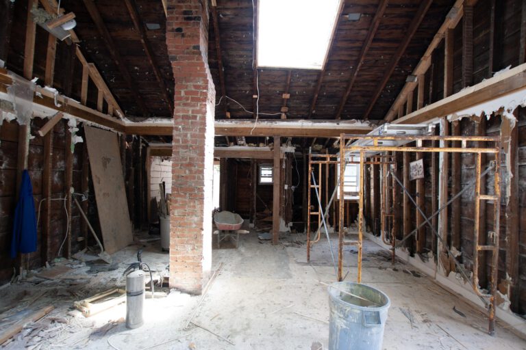 near completed interior demolition service with all walls and ceilings stripped of materials