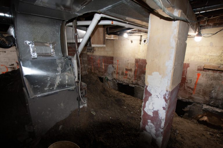 residential underpinning preparation, soil removed from under the foundation
